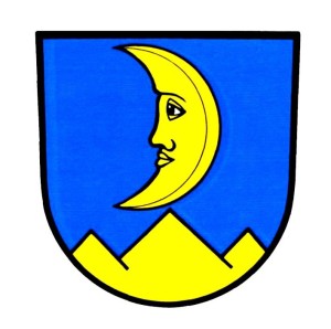 Das Wappen Dettighofens zeigt in Blau über einem goldenen Dreiberg einen zunehmenden Mond mit Gesicht.